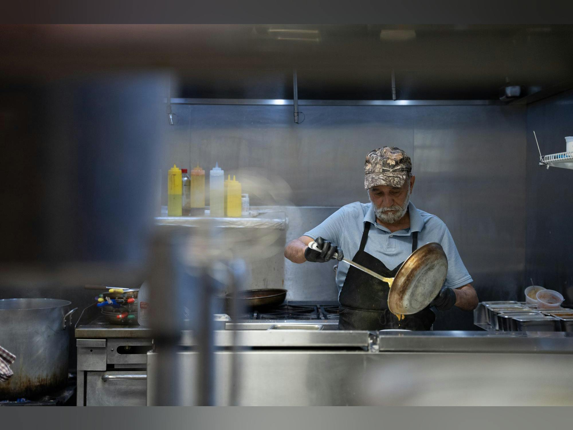 Chef preparing food in a commercial kitchen